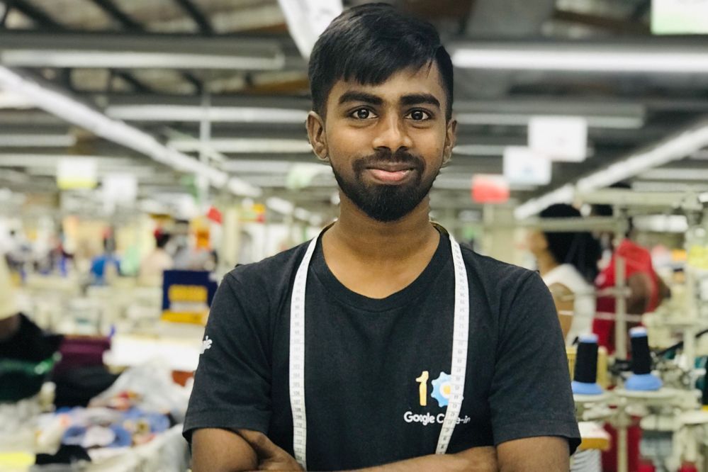 Caption: A photo of Senal wearing a Google Code-in t-shirt at T&FG – Timex Garments in Sri Lanka. (Local Guide @SenalDilanka)