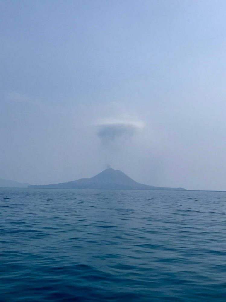 Caption: Mount Krakatau from a far, taken from a boat in Sunda strait by LG @indahnuria