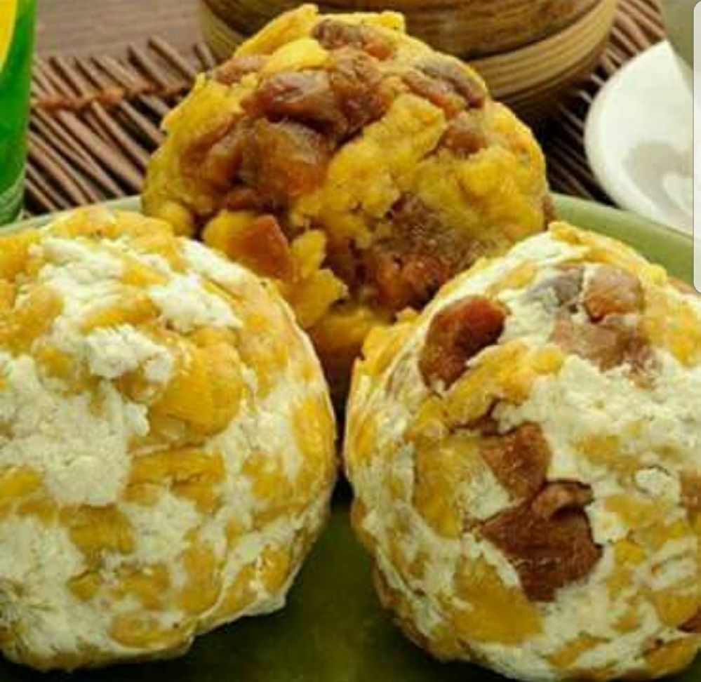 Bolón de Verde: Ecuadorean Green Plantain Dumplings stuffed with cheese and chicharrón