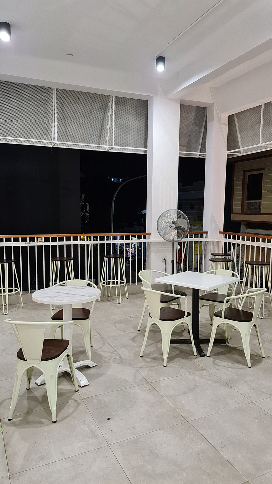 Caption : A photo of the outdoor ambiance at the second floor of Nucifera  Coffee & Pastry. (Local Guide @Velvel)