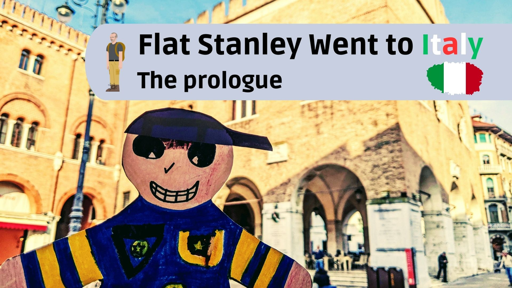 Caption: A close-up photo of Flat Stanley, with Treviso's main square, Piazza dei Signori, behind it. Above the title of the post "Flat Stanley Went to Italy - the prologue" with the Italian flag and, on the left, the figure created by Google to represent Ermes as Guiding Star 2022