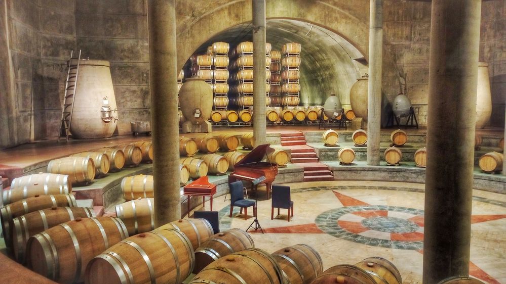 Caption:  oak barrels when with storage wine