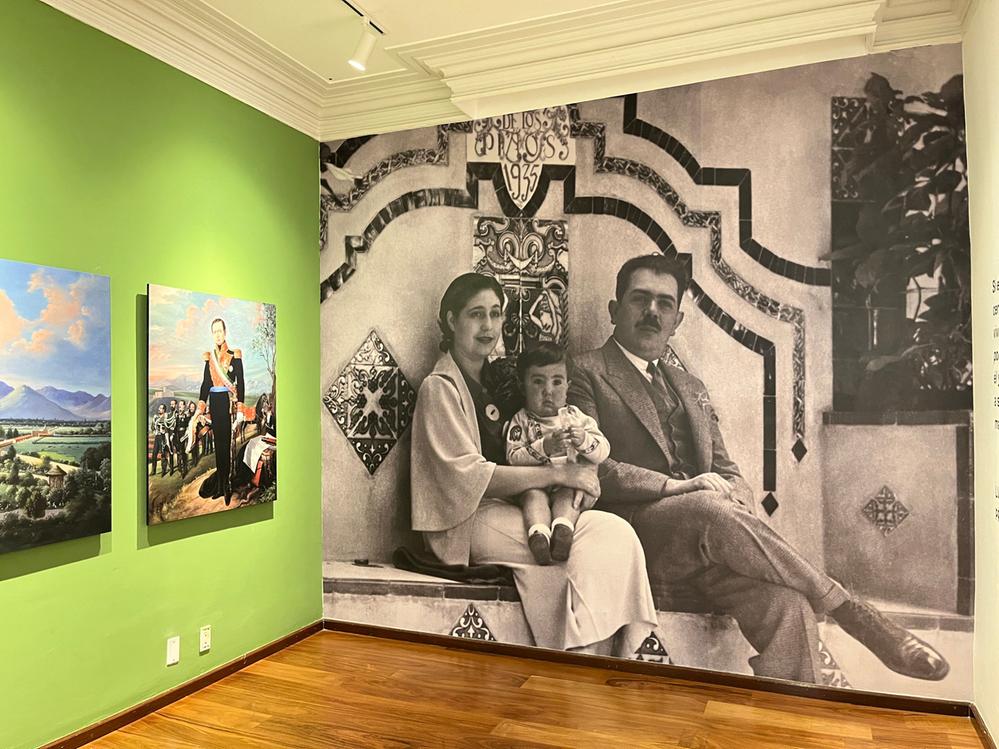 Caption: A photo showing a photograph of President Lázaro Cárdenas with his wife Amalia Solórzano and their son Cuauhtémoc on display at Museo Casa Presidencial Lázaro Cárdenas. (Local Guide @LightRich)