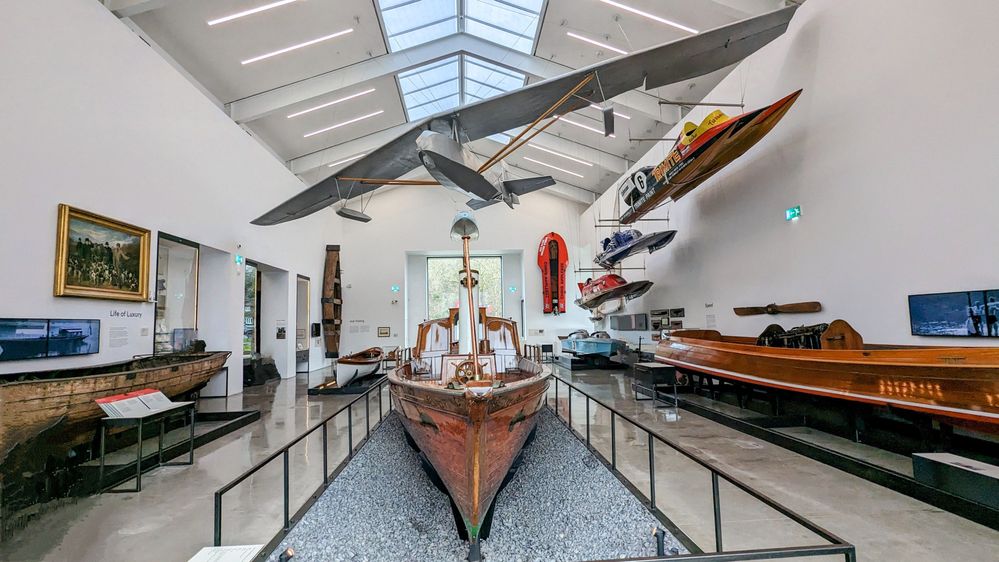 Caption: A photo of the Jetty Museum showing some of the boats on display in a brightly lit room. (Local Guide @RussKH)