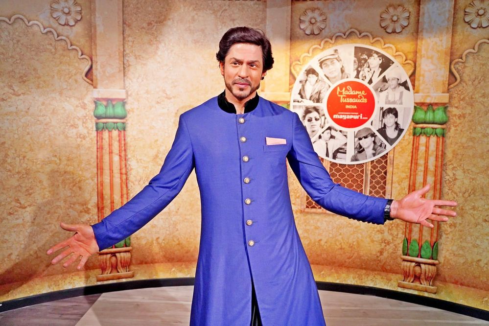 Caption: A photo of the wax figure of the Indian actor Shahrukh Khan at Madame Tussauds India. (Local Guide @TravellerG)