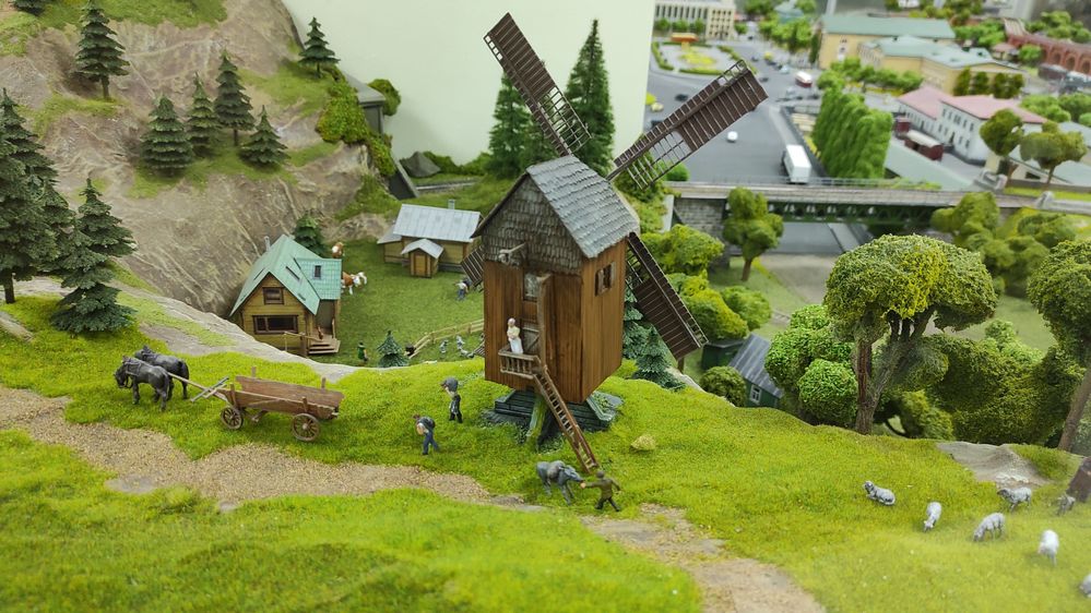Caption: A photo showing a model of a windmill, people, and animals on display at the Museum of Transport Models. (Local Guide @YuliiaZa)