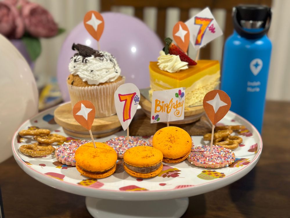 Caption: Happy 7th Birthday Connect cake consists of mango coconut slice, oreo cupcake and orange macaron