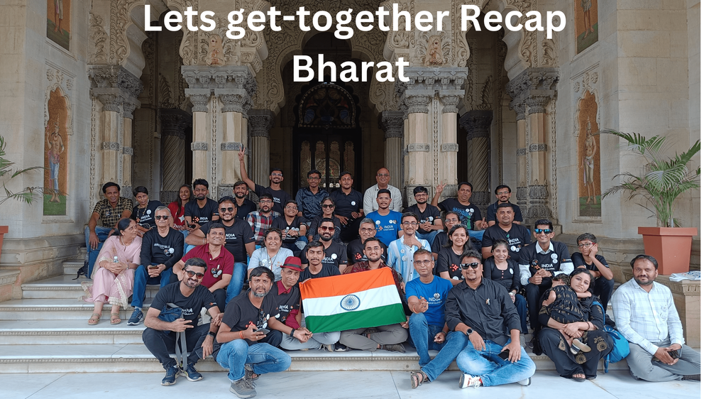 A group photo of the local guides gather  on a meet up  holding flag of bharat