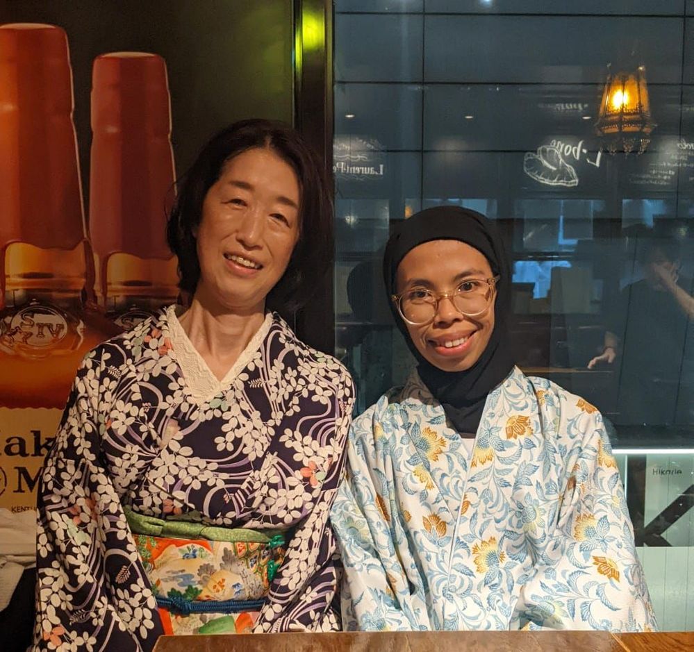 Caption: Local Guides Nunung and Izumi wear Japanese Traditional Cloth