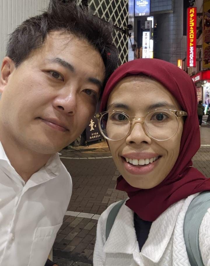 Caption: Local Guides Nunung took a picture with Japanese man