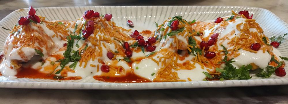 Dish Name : Palak Patta Chaat - Fried Spinach leaves covered with Yoghurt and sauces!