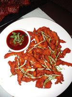 Chicken Kurkure is a crispy chicken made up of boneless chicken alongside with chilli flakes and some spices.