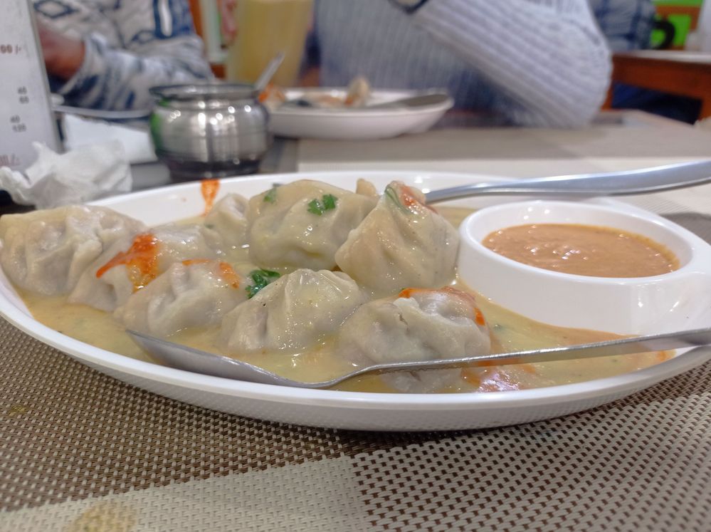 Momos are a type of steamed filled dumpling in Nepali Cuisine. Momos are usually served with jhol aachar (Its like momos soup) in kathmandu.