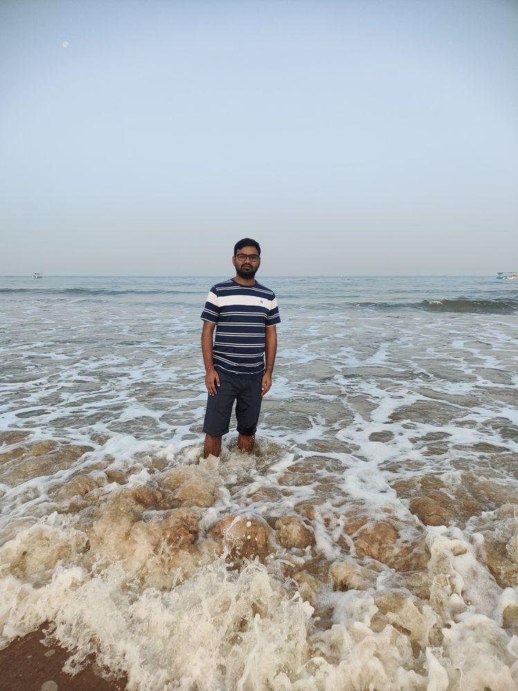 One person (LG @NandKK ) standing infront of a beach (Malvan beach) (photo by LG @NandKK)