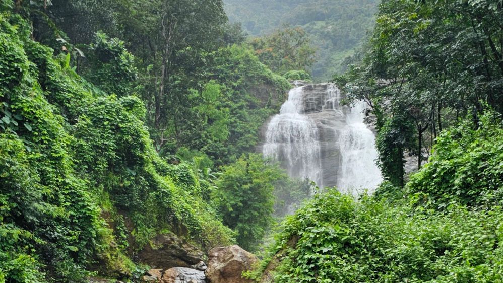 #1 A view of an amazing waterfall on our way from Kochi to Thekkady .