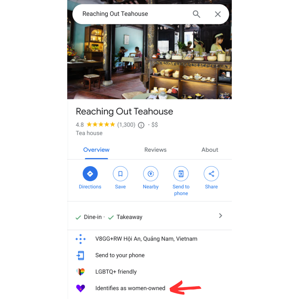 Caption: A screenshot of the business listing of Reaching Out Teahouse on Google Maps, showing the “Identifies as women-owned” attribute and a red arrow pointing to it.