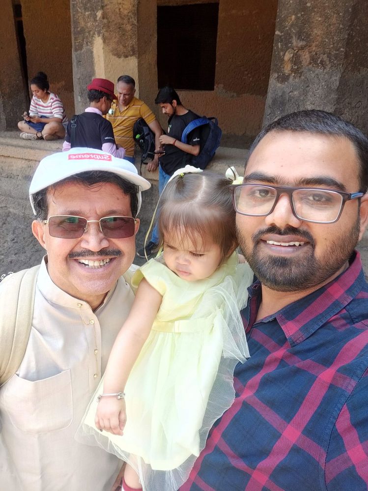 LG @NandKK taking selfie with LG @TravellerG along with his one year old daughter