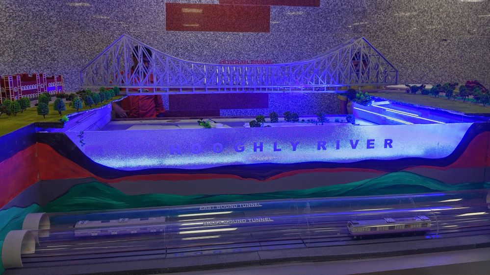 A miniature model depicting the underground metro rail tunnel under river Ganga connecting Kolkata and Howrah that is located in close proximity to the famous Howrah bridge overhead
