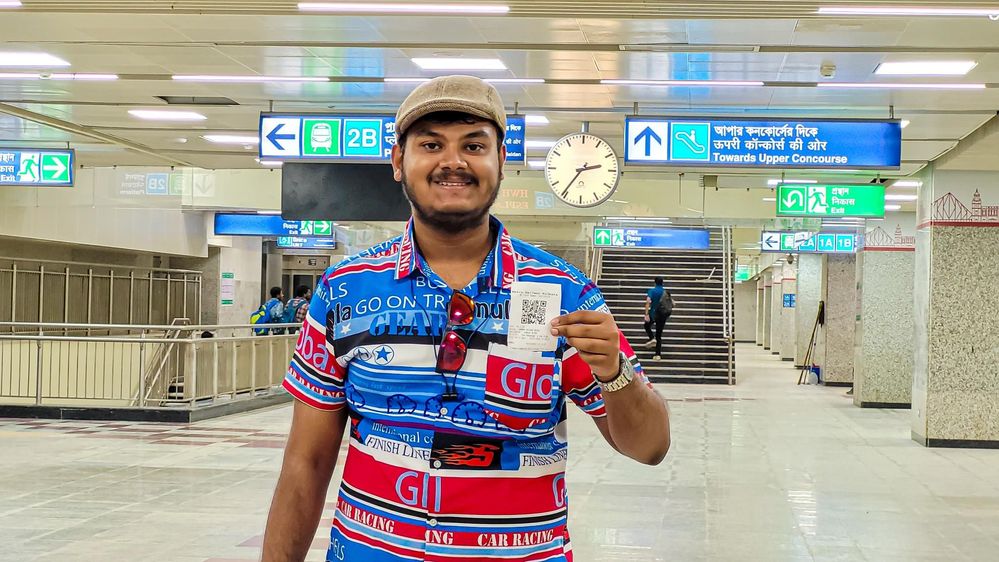 Flaunting the QR ticket at Howrah Metro Station