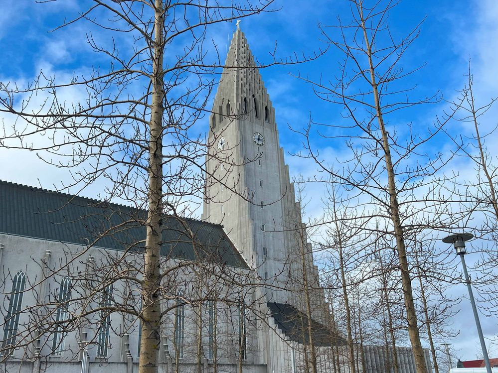 Caption: Rainbow Street leads directly to Hallgrimskirkja - Reykjavik's iconic modern church.
