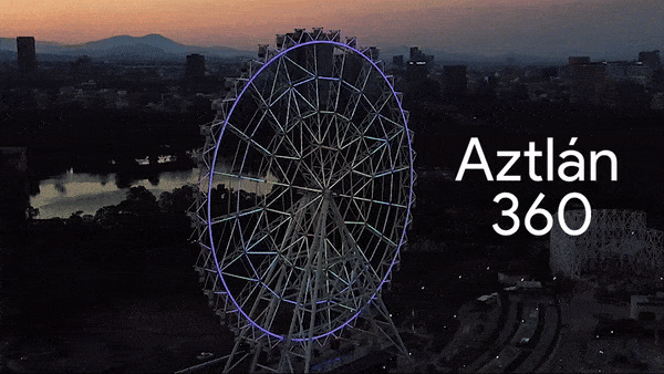 Caption: Animated GIF of a drone shot of the ferris wheel at sunset by LaloPadilla