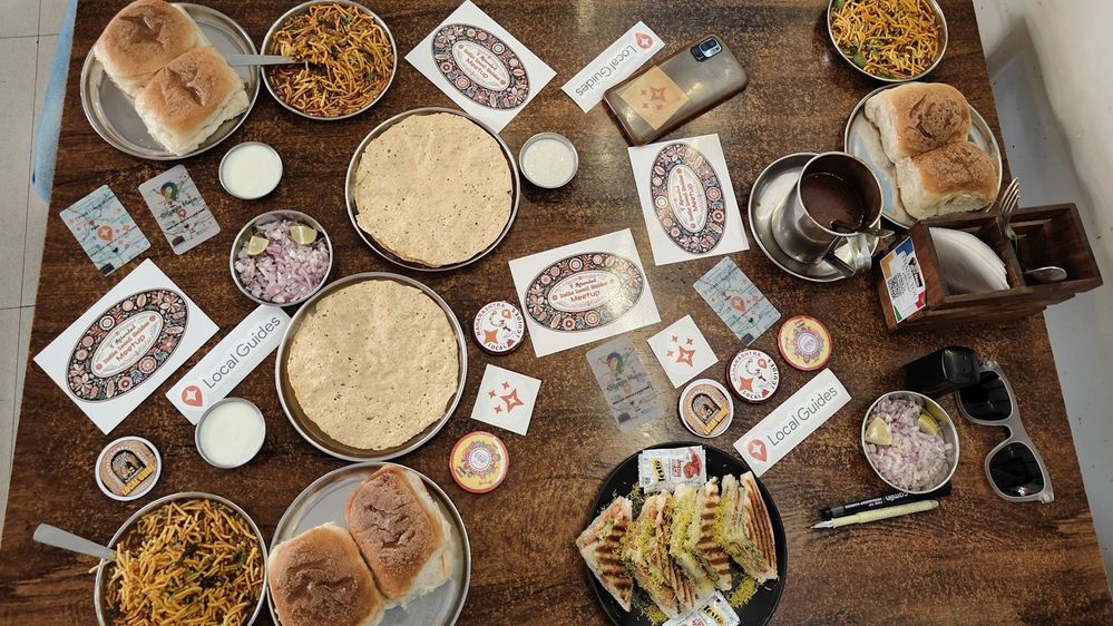Stickers, Badges, Cards, Souvenirs, and Misal Pav - The First meetup of Local Guides in Nashik, India