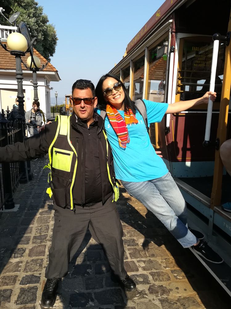 Caption: Local Guide @KarenVChin having fun with the Cable Car's people during a ride - Photo: Local Guide @ermest