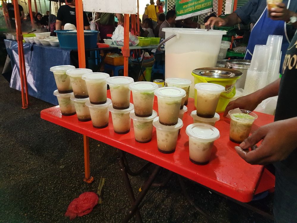 Local favorite sweet drink dessert: Cendol. Coconut milk, flavored with palm sugar and green jelly.