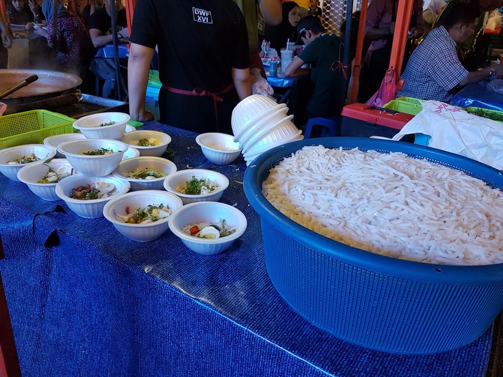 Malaysian Fish Asam Laksa. A spicy, sourish noodles dish with local mackerel fish.