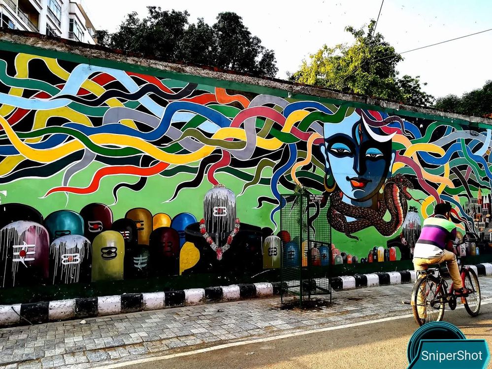 Graffiti in a street showing Lord Shiva