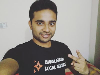 Wearing Bangladesh Local Guides T-shirt