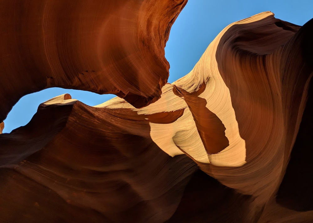 Caption: Looking at the sky from the bottom of the canyon