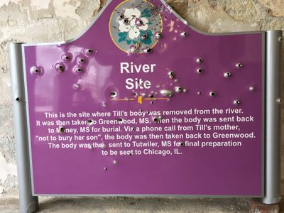 Vandalized historic marker (at Emmett TIll Interpretive Center) for where Emmett Till's body was found. It is being replaced soon.