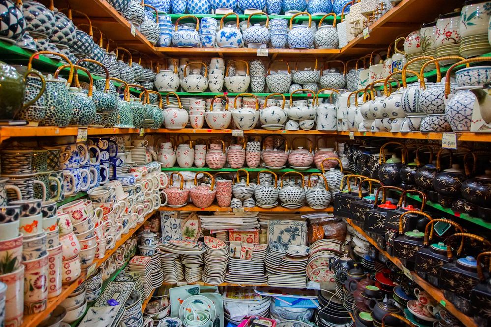 Colorful pots on shelves in a store. (Getty Images)