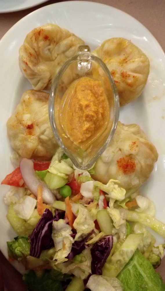 I don't remember the name of this dish, but it's some sort of dumplings stuffed with meat, vegetables and spices