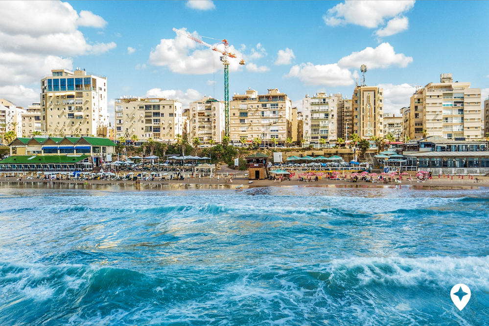Mediterranean beach scene by Hayim