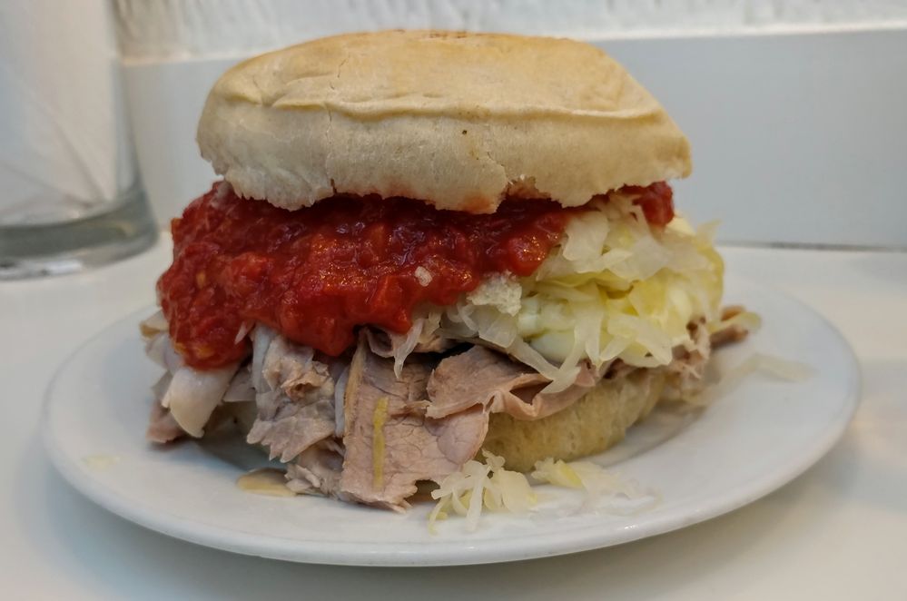Beef sandwich with Sauerkraut, cheese, tomato sauce and mayo