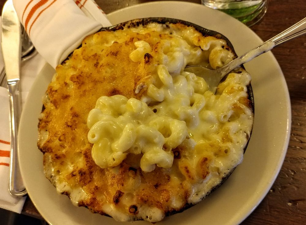 Mac & cheese, with the cheese burned at the top