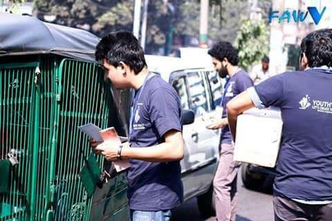 Volunteers on Busy Road collecting funds for Charity