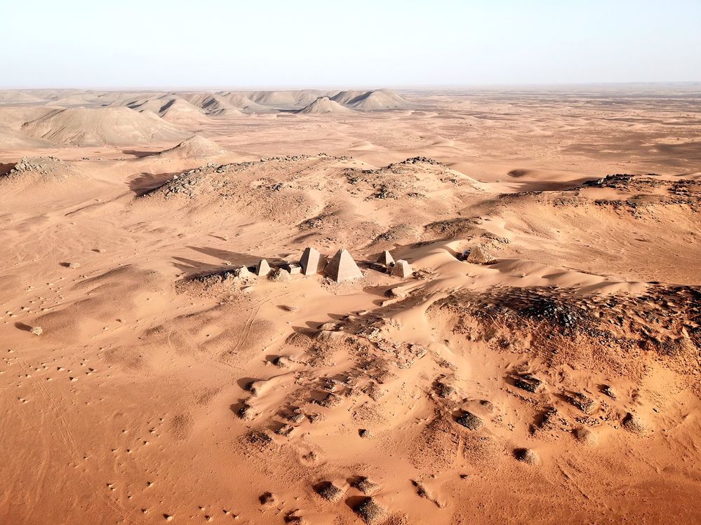 About 220 pyramids were built in three areas of Nubia as the tombs of the kings, queens of Nabata and Mero, who ruled the kingdom of Kush. The first pyramids were built in the Kru region. It includes the tombs of the Malakashta and his son Biya or Ankhi, with shrines to commemorate Shabaka and Tannout Amani, and the pyramids of 14 queens.  Later pyramids were built in Nuri, on the west bank of the Nile in Upper Nubia. This cemetery included the graves of 1 king and 52 queen and princess. The oldest and largest of the pyramids of Nuri is the king of the prophet and Pharaoh the twenty-fifth family, the pharaoh Taharaqa.  The most densely built Nubian pyramids site is Marwa, located between the fifth and sixth waterfalls of the Nile, about 200 km north of Khartoum within Sudan's borders. During the irrigated period more than forty kings and queen were buried there.  The size and dimensions of the pyramids of Nubia differ significantly from those of the Egyptian Pyramids. They are much sma