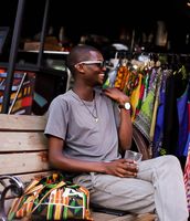 I enjoy the little things in life, from food events to a good old outdoorsy brunch. This image of me was taken in Nairobi, Kenya at the K1 Flea Market .