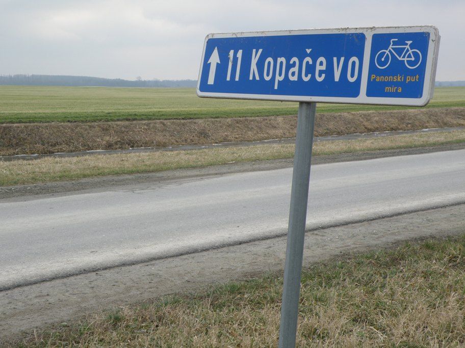 Blue signs marking the Pannonian Peace Route