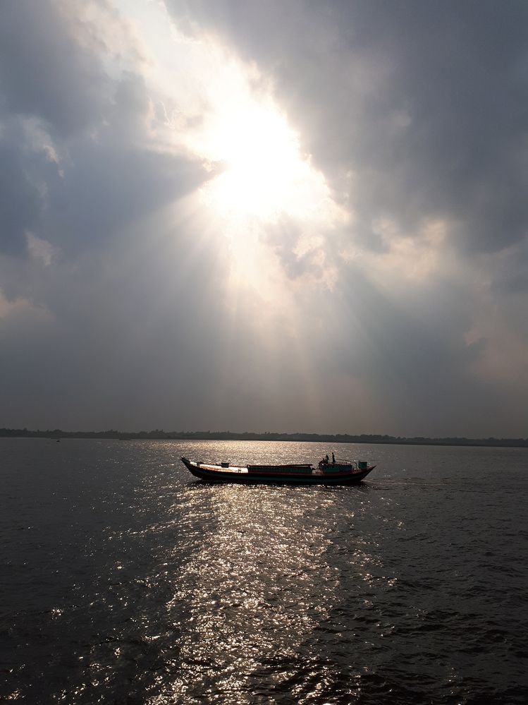 sun shine at meghna river, bangladesh