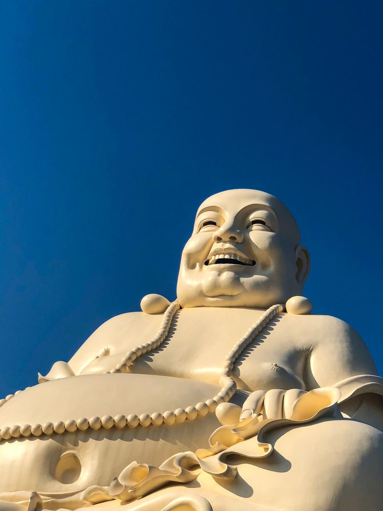 Statue of Budai at Vinh Trang Temple