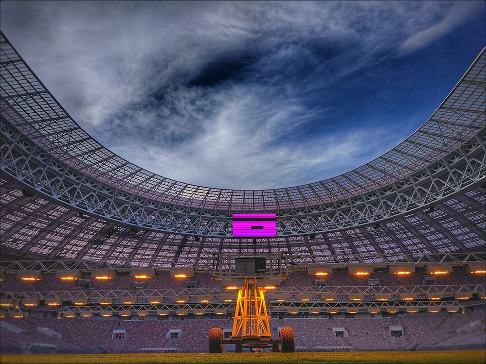 Caption: A photo of Luzhniki Stadium in Moscow, Russia, in the evening. (Local Guide Andry Ivanov)