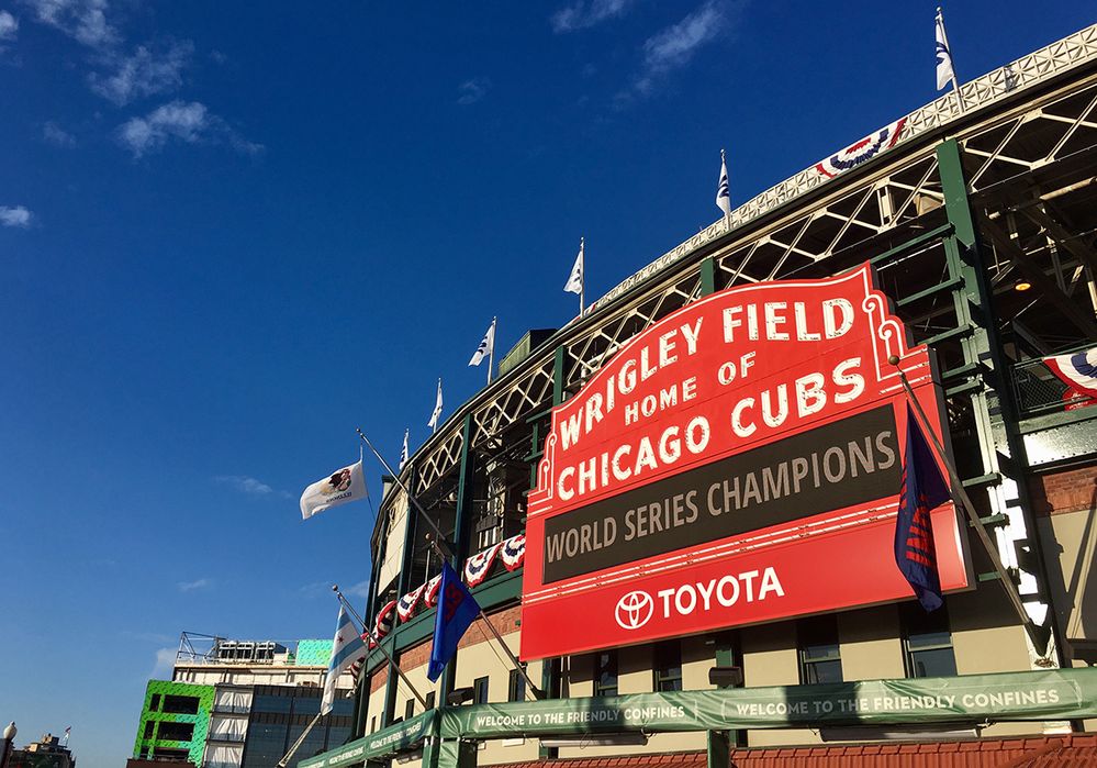 Caption: A photo of the exterior and signage of Wrigley Field in Chicago, Illinois. (Local Guide Benjamin Gordon)