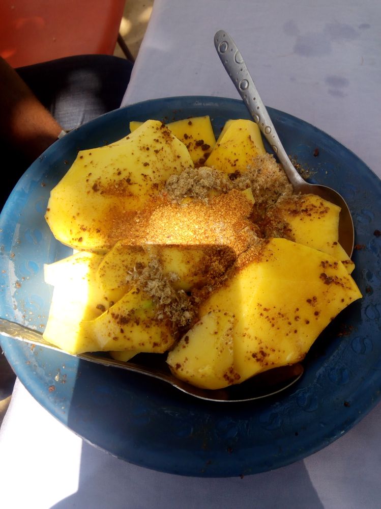 this is a FIrst, Mangoes served with seasoning, crayfish and chilli