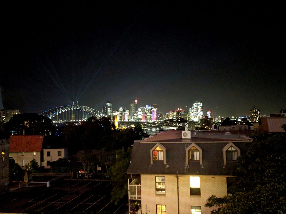 Caption: The city of Sydney at night from North Sydney train station.