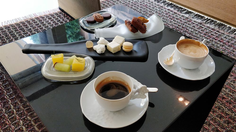 Caption: A photo of coffee and desserts on a table at El Celler de Can Roca in Girona, Spain. (Local Guide Carlomagno Cardenas)