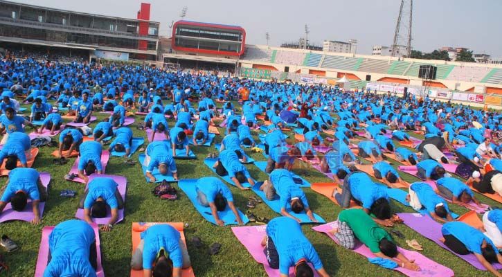Yoga session at Bangabandhu International Stadium, Dhaka, Bangladesh.